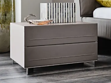 Cattelan Italia wooden nightstand covered in leather.