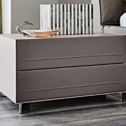 Cattelan Italia wooden nightstand covered in leather.