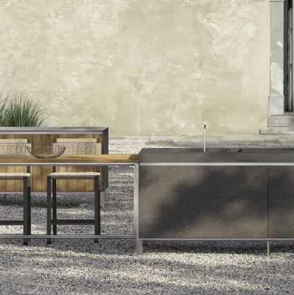 Outdoor design kitchen with double Helios island in volcano ceramic and teak by Molteni & C