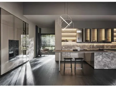 Design kitchen with Prime peninsula in glossy lacquered Clay and Molteni & C Stone.