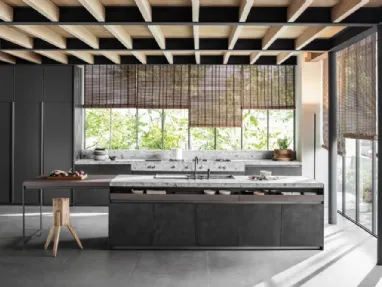 Design kitchen with VVD island in Railway Steel iron and Molteni & C Molteni & C stone top.