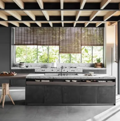 Design kitchen with VVD island in Railway Steel iron and Molteni & C Molteni & C stone top.