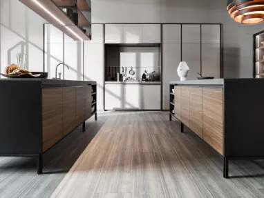 Design kitchen with VVD island in Walnut with top in Green Porphyry and columns in matte lacquer by Molteni & C.