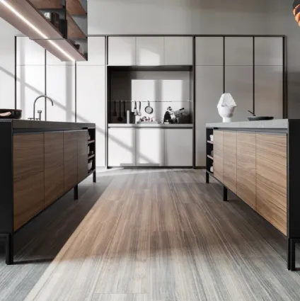 Design kitchen with VVD island in Walnut with top in Green Porphyry and columns in matte lacquer by Molteni & C.